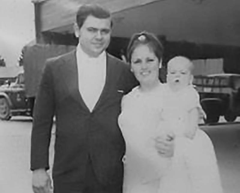Mark and Joyce Cain with baby Brad after stepping off the airplane in Bogot&aacute;, Colombia