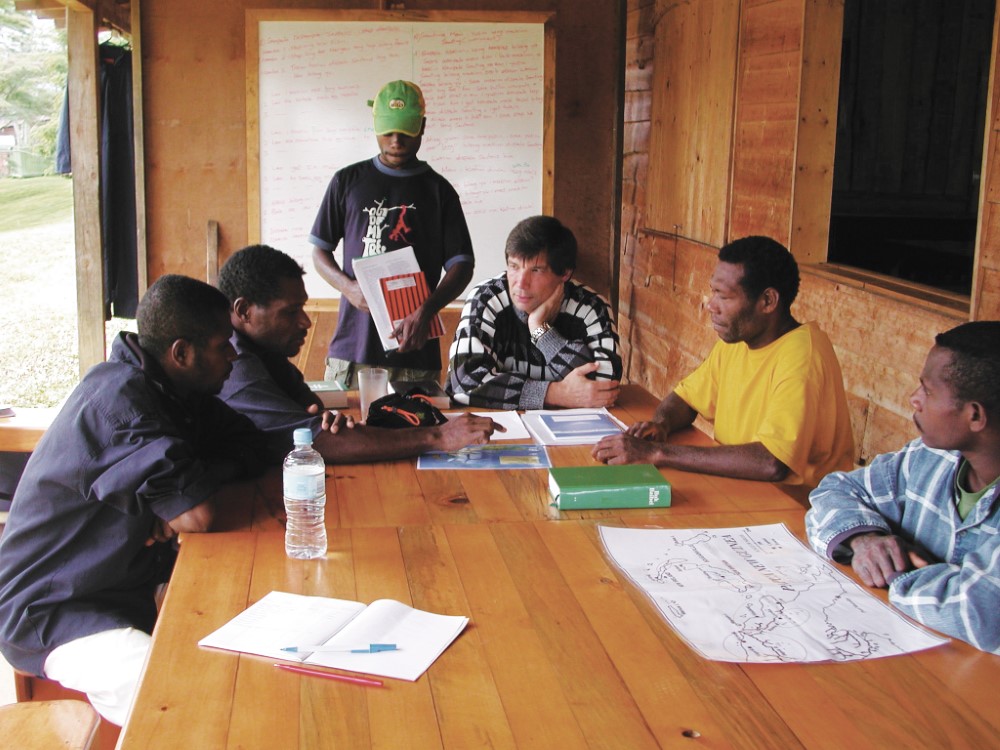 2004 Listening to church elders as they discuss outreach efforts.