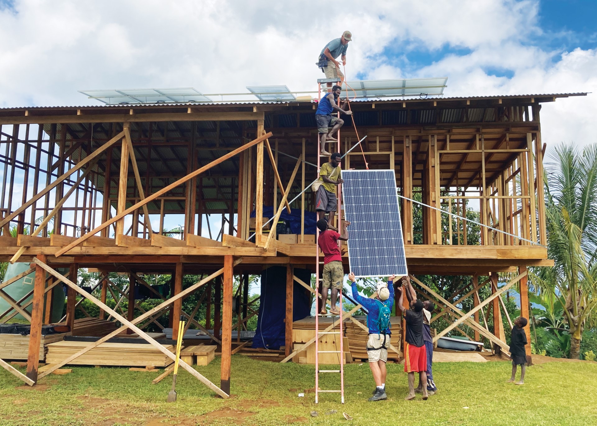A team installs solar panels on missionary Jonathan Ames&rsquo;s house in Kuyu, Papua New Guinea.